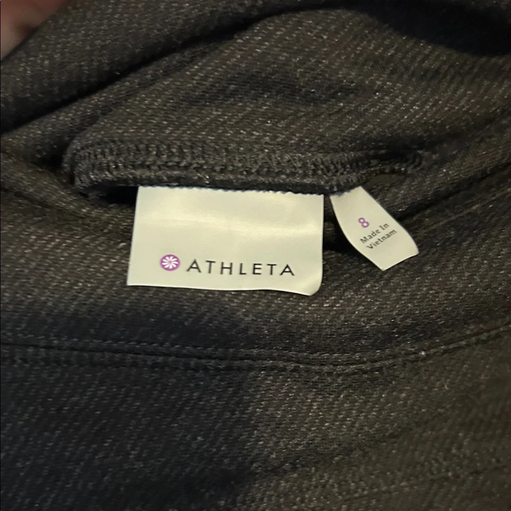 Athleta Black Mini Skirt (No Shorts) Zipper. Size 8 Fixed slight hole (Pictured) - Picture 4 of 11